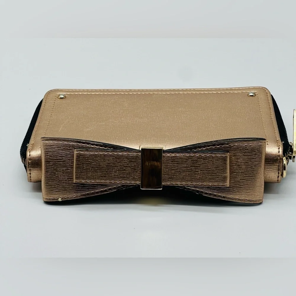 Aldo rose gold wallet with top bow